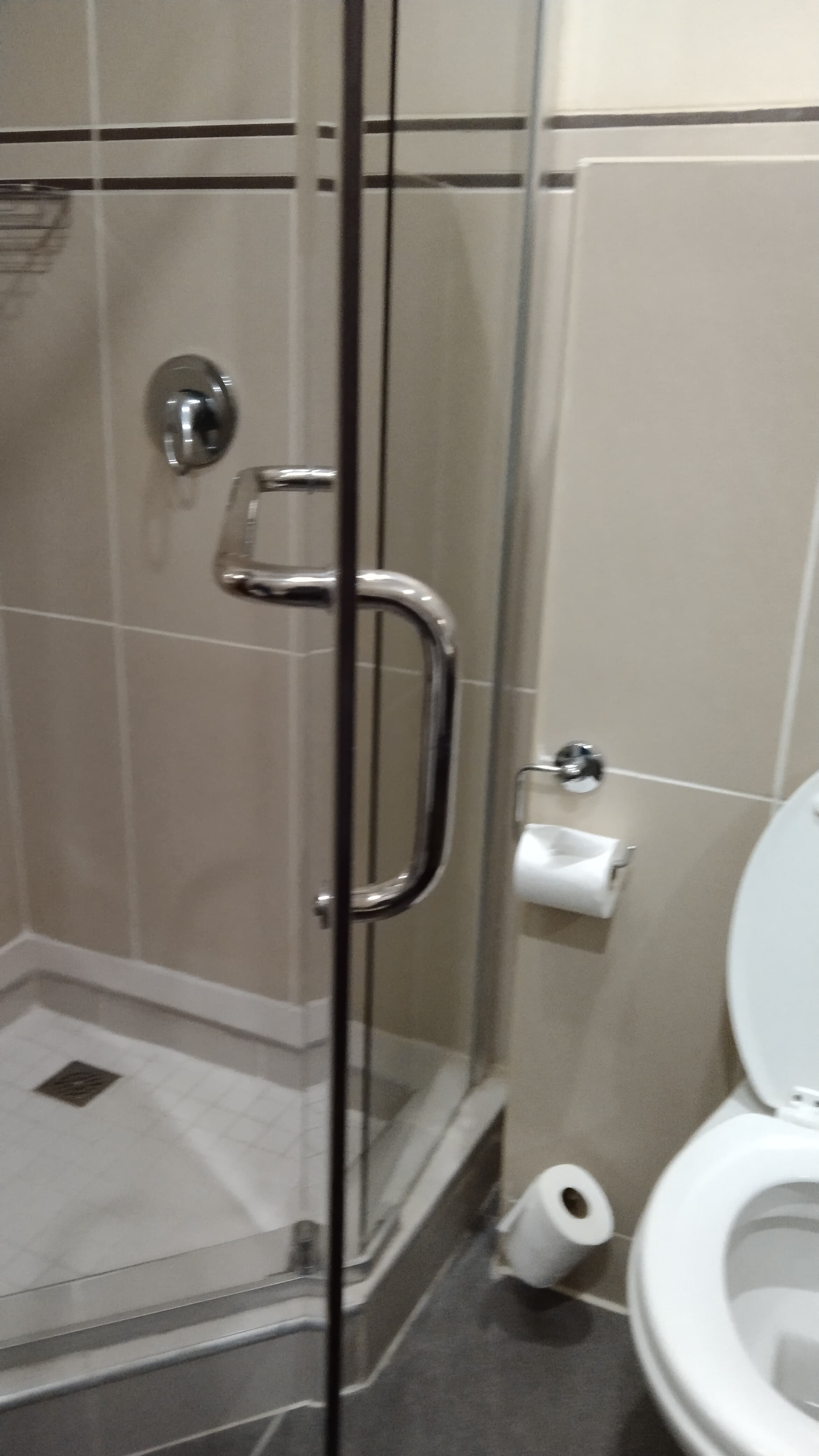 Custom Shower Enclosure Custom-made shower enclosure with glass panels